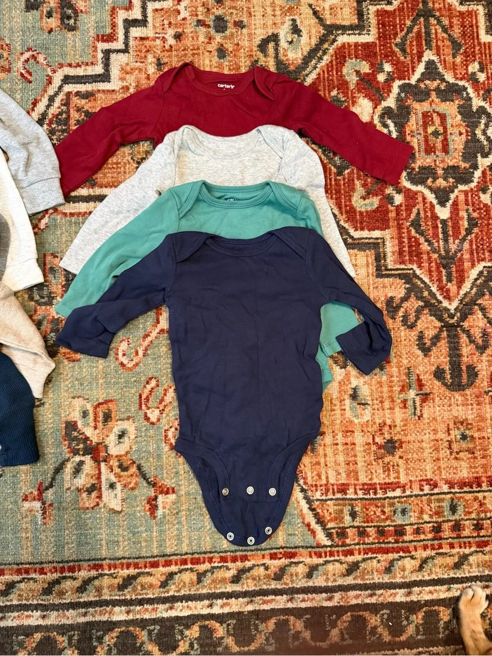 Carter's Long-Sleeve Baby Onesies in Navy, Red, Green, Gray, Cream, Beige